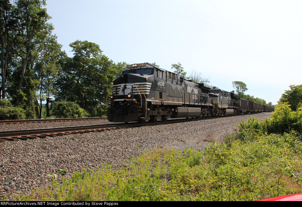 NS 4530 leads train 591 down the Cove PA siding with 130 empty coal hoppers